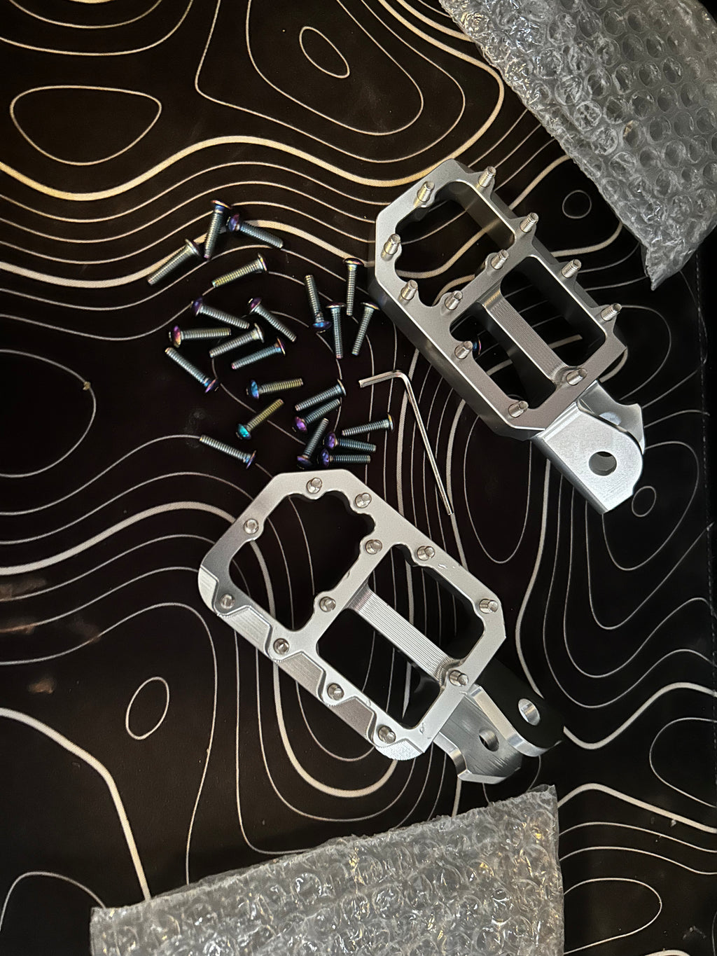 Silver pegs